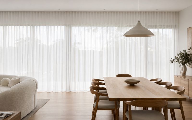 Sheer layer of a double curtain setup
